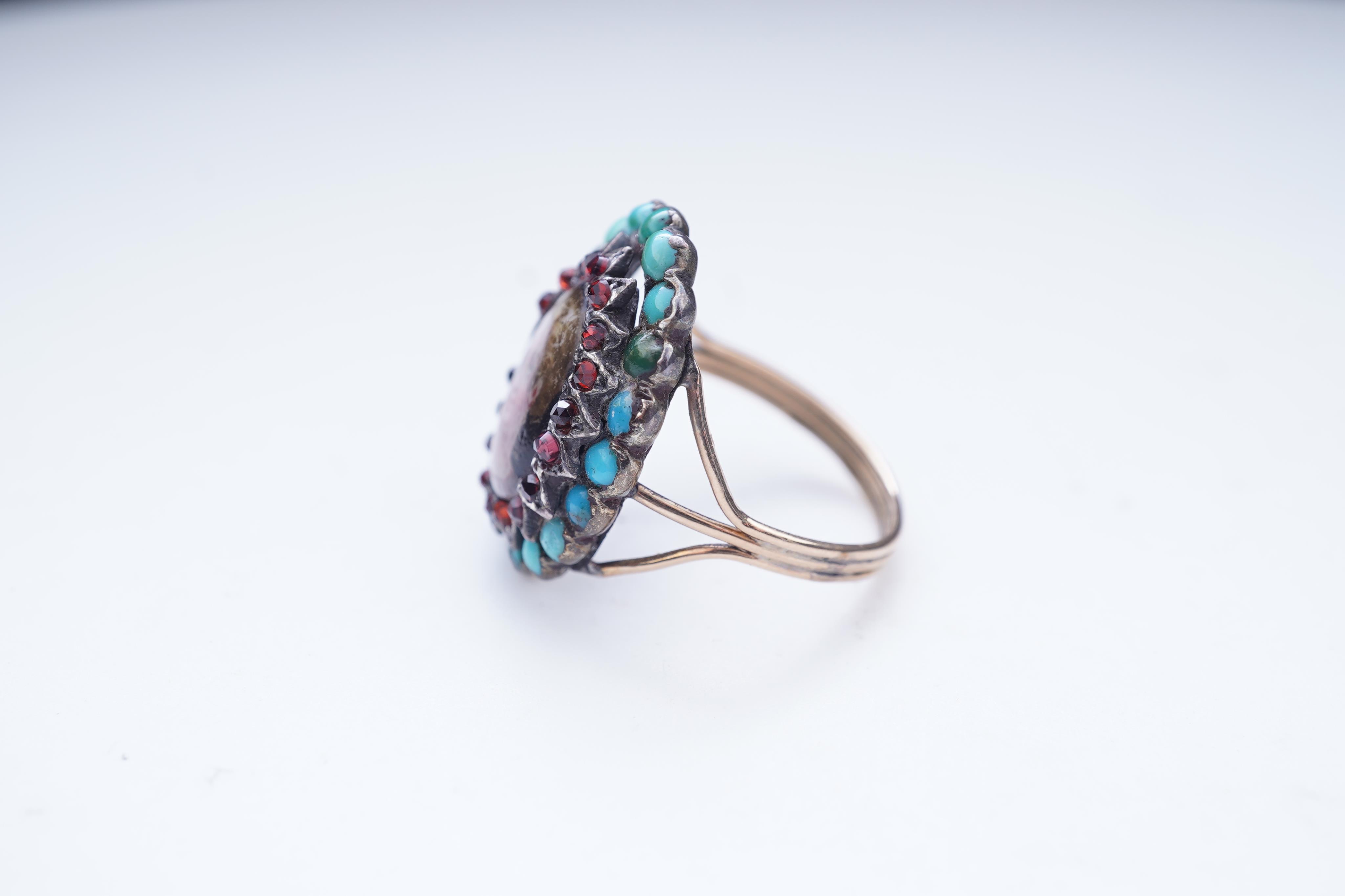 An enamel miniature, turquoise and garnet ring
